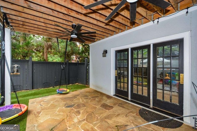 view of patio featuring ceiling fan