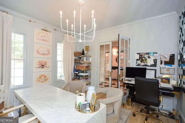 home office featuring wood-type flooring, ornamental molding, and a chandelier