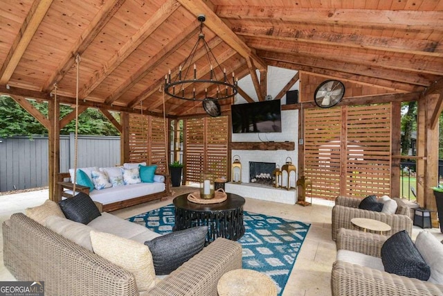 view of patio / terrace featuring an outdoor living space with a fireplace