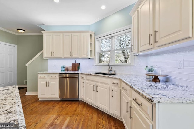 kitchen featuring light stone countertops, dishwasher, sink, crown molding, and light hardwood / wood-style floors