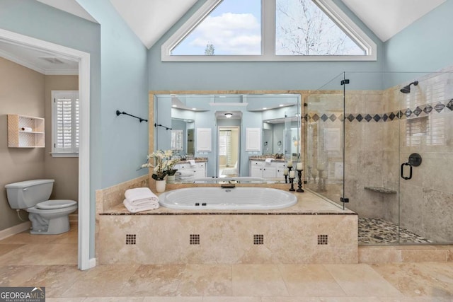 full bathroom featuring separate shower and tub, a wealth of natural light, and vaulted ceiling