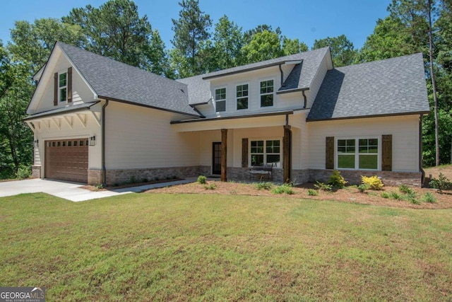 view of front of house with covered porch and a front yard