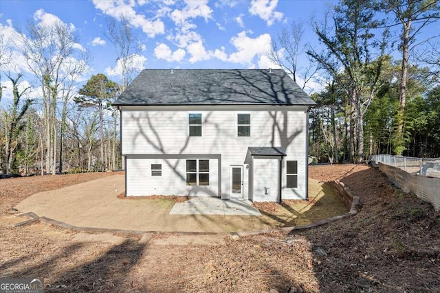 rear view of house with a patio