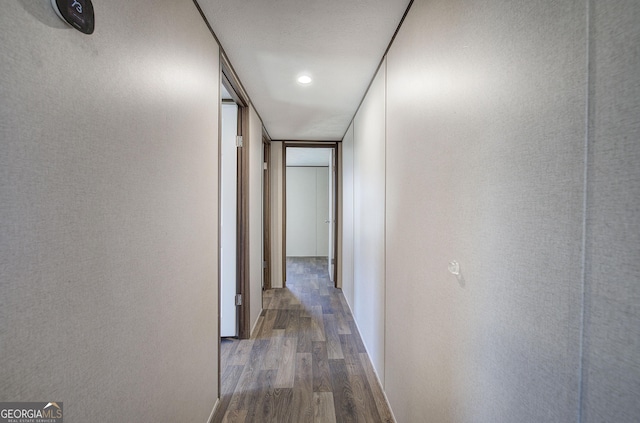 hallway featuring hardwood / wood-style floors