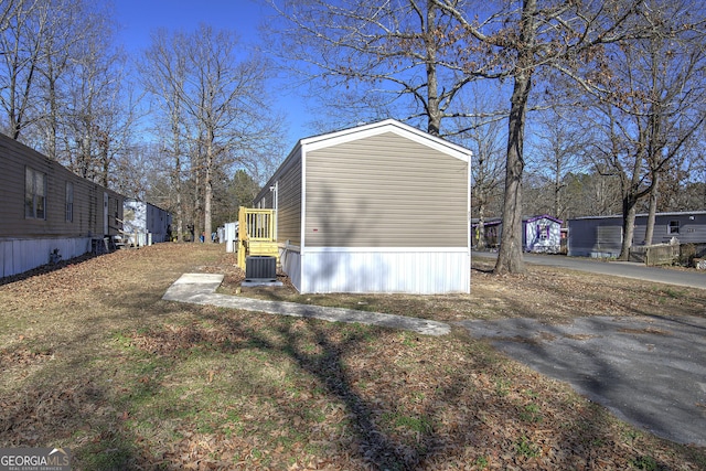 view of home's exterior with cooling unit