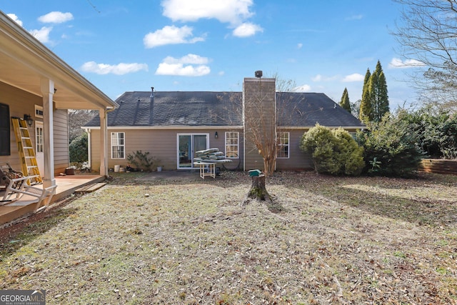 back of house featuring a patio area