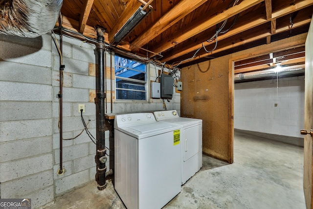 laundry room featuring separate washer and dryer and electric panel