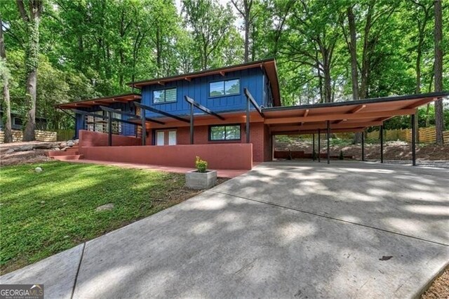 view of front of property with a carport