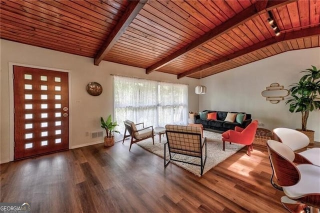 living room featuring hardwood / wood-style flooring, lofted ceiling with beams, and wooden ceiling