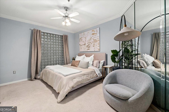 carpeted bedroom featuring ceiling fan and ornamental molding