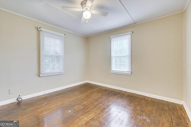 711 Stone Ave, Waynesboro, GA 30830 - spare room with dark hardwood / wood-style floors and ceiling fan