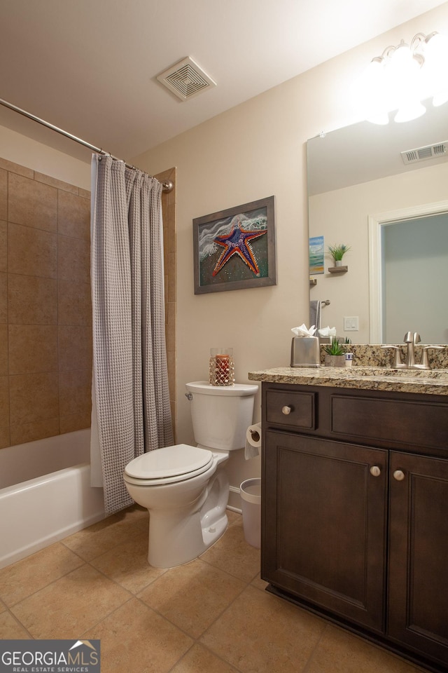 full bath with toilet, vanity, visible vents, and tile patterned floors