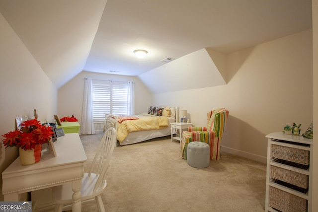 carpeted bedroom featuring vaulted ceiling, visible vents, and baseboards