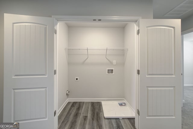 laundry room with washer hookup, electric dryer hookup, and dark wood-type flooring