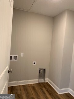 washroom with baseboards, laundry area, dark wood-style flooring, and hookup for an electric dryer