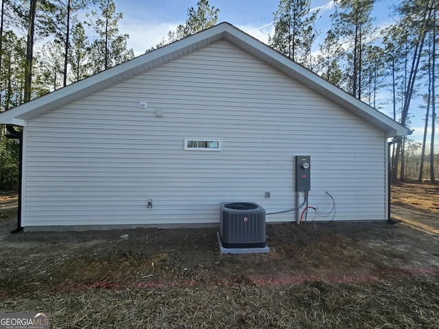 view of home's exterior featuring central AC