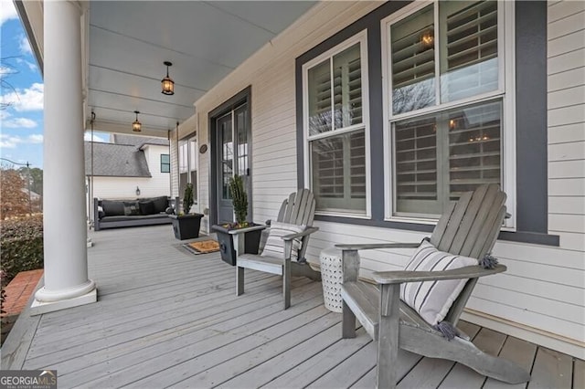 wooden terrace with covered porch