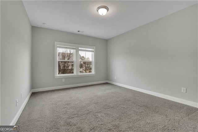 empty room with carpet floors