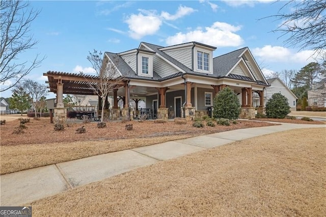 view of front facade with a porch and a pergola