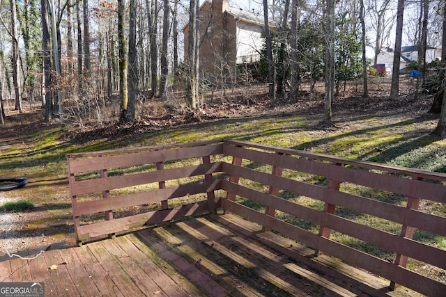 view of yard featuring a wooden deck