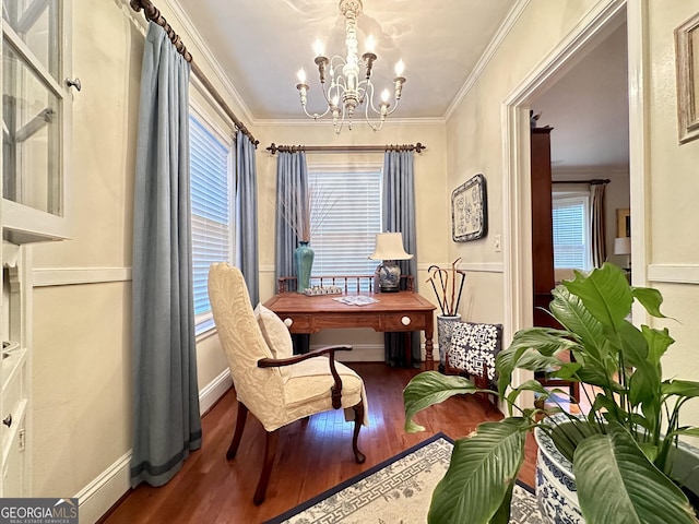 office space with ornamental molding, hardwood / wood-style floors, and a notable chandelier