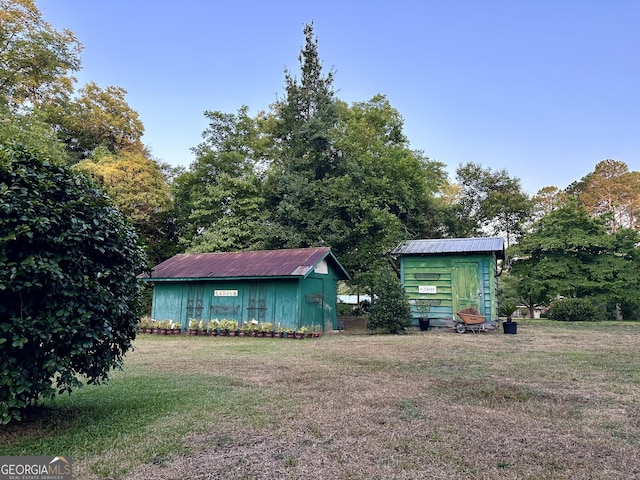 exterior space featuring a storage shed