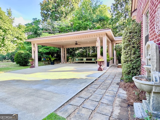 view of patio featuring a gazebo and ceiling fan