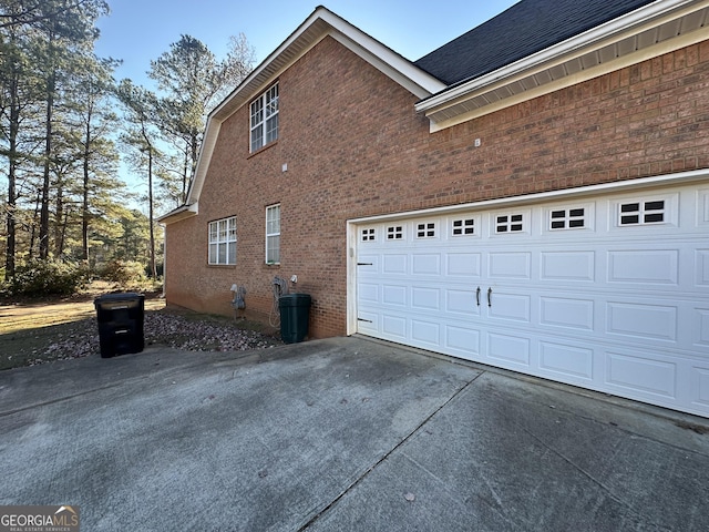 view of home's exterior with a garage