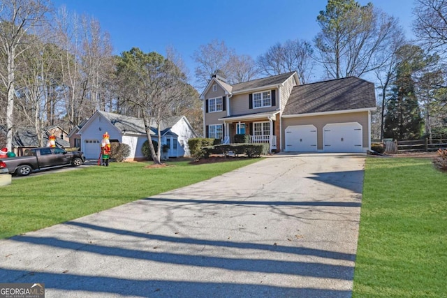 view of front property featuring a porch, a garage, and a front yard