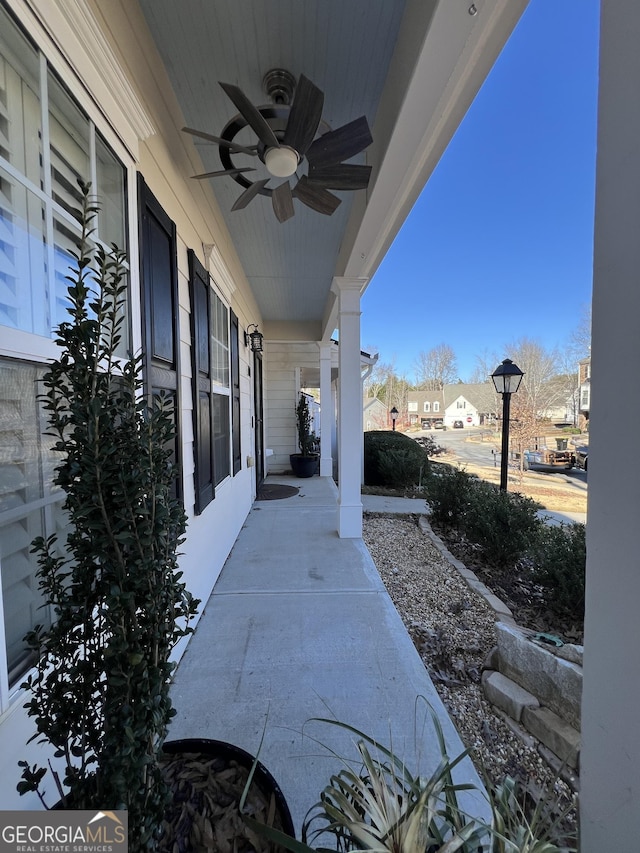 view of patio featuring a porch and ceiling fan