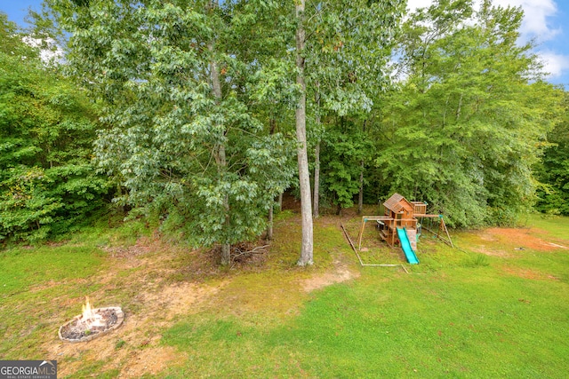 view of yard featuring a playground