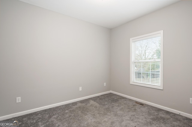 view of carpeted spare room