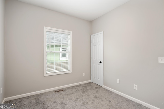 empty room with light carpet