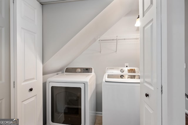 laundry room with independent washer and dryer