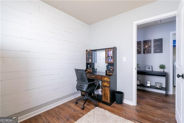 office with dark hardwood / wood-style floors