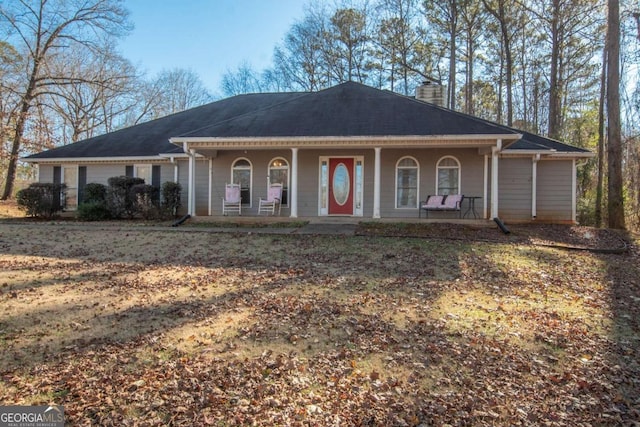 single story home with covered porch