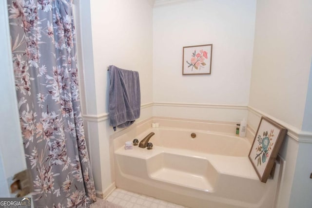 bathroom with a tub to relax in