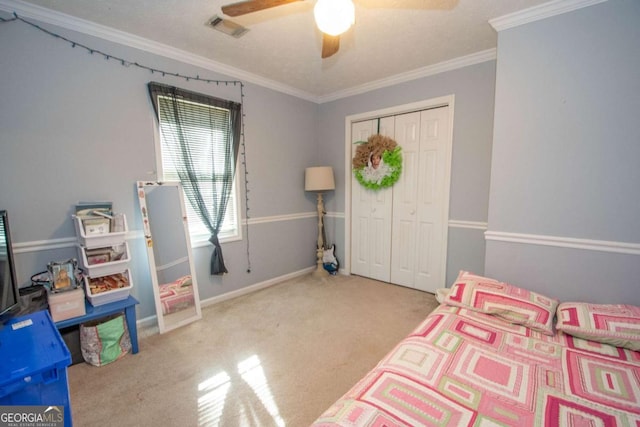 306 Washington Way, Lagrange, GA 30240 - carpeted bedroom featuring a closet, crown molding, ceiling fan, and baseboards