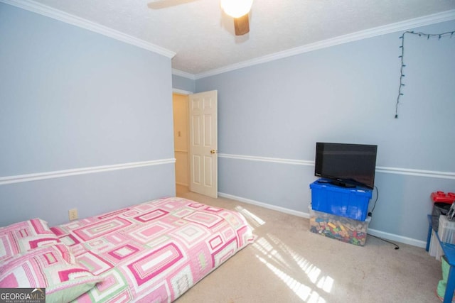 bedroom featuring carpet, ceiling fan, crown molding, and a textured ceiling