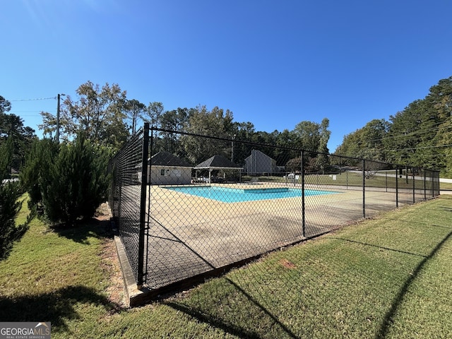 306 Washington Way, Lagrange, GA 30240 - community pool with a lawn and fence