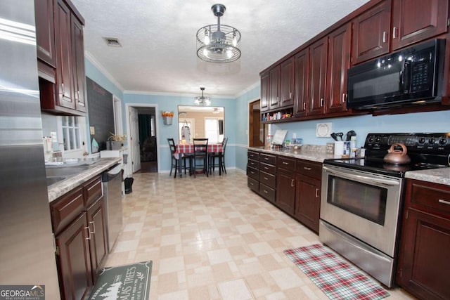 kitchen featuring a notable chandelier, decorative light fixtures, ornamental molding, and appliances with stainless steel finishes