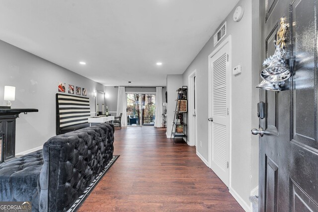 living room featuring dark hardwood / wood-style flooring