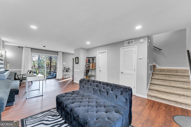 living room featuring dark hardwood / wood-style floors