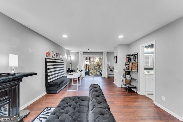 living room with dark wood-type flooring