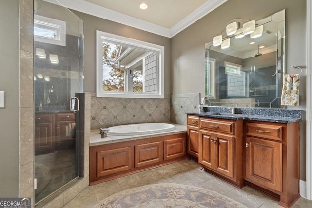 bathroom featuring plus walk in shower, vanity, and crown molding