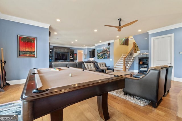 rec room featuring ceiling fan, pool table, light hardwood / wood-style floors, and ornamental molding