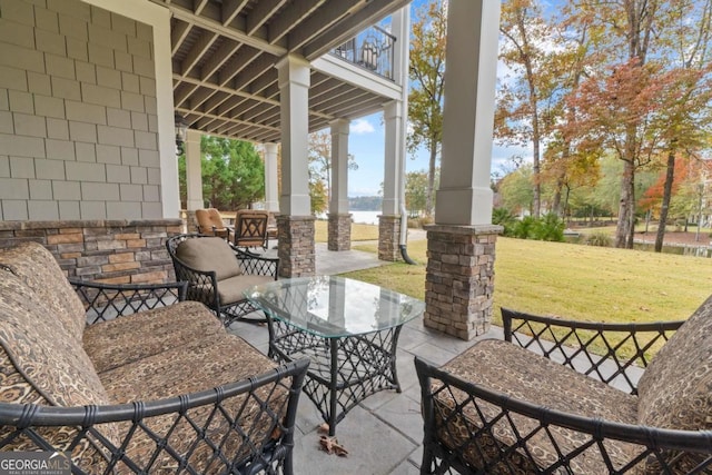 view of patio / terrace with outdoor lounge area and a balcony