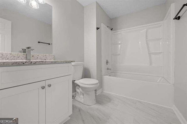 full bathroom with a textured ceiling, vanity, toilet, and tub / shower combination