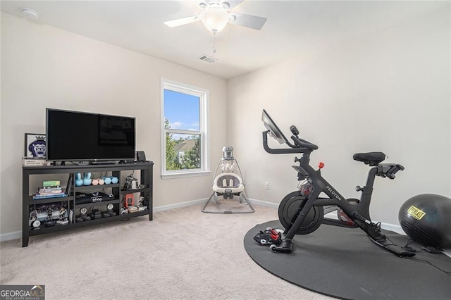 workout area with carpet flooring and ceiling fan