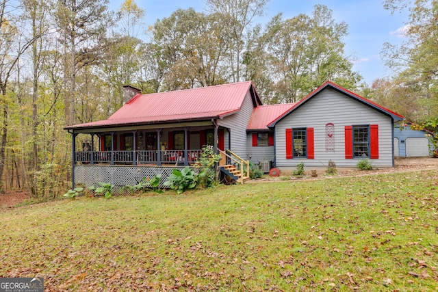 view of front of house featuring a front yard and a porch